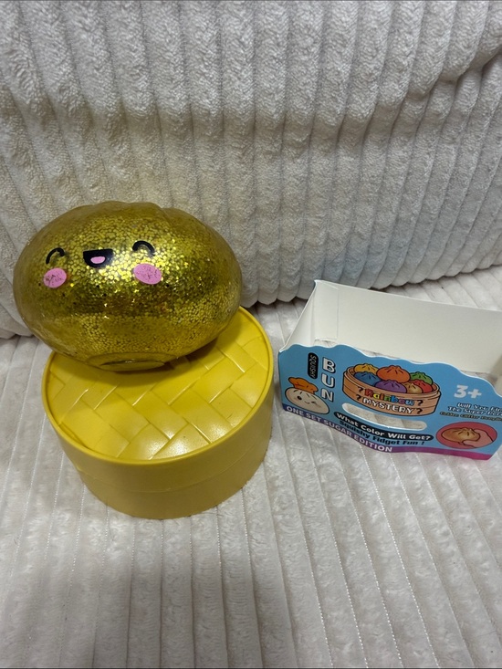 Squishy Bun Other - GOLDEN GLITTER DUMPLING - Squishy Bun Rainbow Mystery- New. In package. As Is.